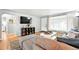 Cozy living room with a comfortable sofa, stylish decor, and ample natural light, creating a welcoming atmosphere at 1924 Yosemite St, Denver, CO 80220