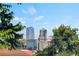 Enjoy city views of the Denver skyline from this charming home with mature landscaping and a relaxing atmosphere at 3039 W 22Nd Ave, Denver, CO 80211