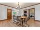 Dining room with light wood trim and adjacent rooms at 3039 W 22Nd Ave, Denver, CO 80211