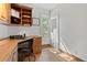 Bright office space with built-in natural wood cabinets and drawers at 3039 W 22Nd Ave, Denver, CO 80211