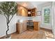 Office with built-in natural wood cabinets and desk at 3039 W 22Nd Ave, Denver, CO 80211