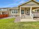 Back of house showing outdoor deck and sliding glass doors for indoor/outdoor living at 14880 Chicago St, Parker, CO 80134