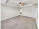 Spacious bedroom with tray ceiling and neutral carpeting, ready for your personal touch at 14880 Chicago St, Parker, CO 80134
