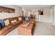 Comfortable living room featuring a stone fireplace and an open floor plan at 430 Zang St # 4-103, Lakewood, CO 80228