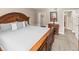 This main bedroom offers a walk-in closet and a glimpse of the en-suite bathroom at 430 Zang St # 4-103, Lakewood, CO 80228