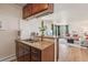 Modern kitchen open to the living room, creating a seamless living space at 320 S Ames St # 8, Lakewood, CO 80226