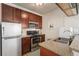 A well-equipped kitchen featuring stainless steel appliances and granite countertops at 320 S Ames St # 8, Lakewood, CO 80226