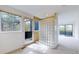 Modern bathroom with unique glass block feature, access to balcony and great view from the window at 4966 Delaware Dr, Larkspur, CO 80118