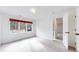 Inviting bedroom with large windows offering scenic views and filled with natural light at 4966 Delaware Dr, Larkspur, CO 80118