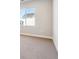 Simple bedroom with carpet and a window offering natural light at 1714 Marlowe W Cir, Erie, CO 80516