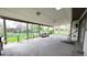 Large covered deck with ample space for seating and entertaining, overlooking the backyard at 6463 Brentwood St, Arvada, CO 80004