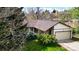 Well-maintained home featuring a two-car garage and mature landscaping in a desirable location at 6463 Brentwood St, Arvada, CO 80004