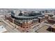 Aerial view of Coors Field ballpark and the surrounding city buildings at 1901 Wazee St # 312, Denver, CO 80202