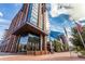 Impressive high-rise building showcasing modern design, extensive glass windows, and commercial signage at 1901 Wazee St # 312, Denver, CO 80202