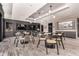 Upscale game room with tables, chairs, and large screen TVs for entertainment at 1901 Wazee St # 312, Denver, CO 80202