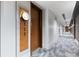 Hallway featuring unit number and stylish carpeting at 1901 Wazee St # 312, Denver, CO 80202