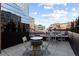 Spacious rooftop deck with sleek furniture and beautiful city views at 1901 Wazee St # 312, Denver, CO 80202