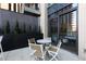 Cozy rooftop deck featuring outdoor seating and views into the living area at 1901 Wazee St # 312, Denver, CO 80202