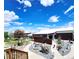 Unique exterior landscape featuring charming stone pathways, decorative features, and well-maintained backyard at 16659 County Road 4, Brighton, CO 80603