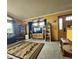 Cozy living room featuring a decorative rug, multiple sofas, and natural light at 16659 County Road 4, Brighton, CO 80603