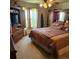 Comfortable main bedroom featuring a large window for ample natural light and a ceiling fan at 16659 County Road 4, Brighton, CO 80603