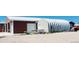 Multiple outbuildings on the property offer ample storage and workspace with an RV nearby at 16659 County Road 4, Brighton, CO 80603