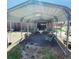 Covered outdoor living area with comfortable seating at 16659 County Road 4, Brighton, CO 80603