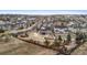 An elevated street view of home's backyard and other homes in the surrounding neighborhood at 24608 E Moraine Pl, Aurora, CO 80016