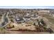 Wide angle aerial view of a neighborhood featuring homes with backyards and lush landscaping at 24608 E Moraine Pl, Aurora, CO 80016