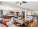 Open living area connected to the kitchen, featuring hardwood floors and comfortable seating at 24608 E Moraine Pl, Aurora, CO 80016