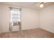 Bedroom with carpet, fan and window with shades at 14272 E Hawaii Cir # B, Aurora, CO 80012