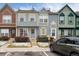 Charming townhouses with colorful siding and well-maintained landscaping at 14272 E Hawaii Cir # B, Aurora, CO 80012