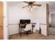 Cozy home office with a ceiling fan and view into the living room at 14272 E Hawaii Cir # B, Aurora, CO 80012