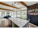 Bright eat-in kitchen with natural light, modern countertops, and an open floor plan at 450 Yukon St, Lakewood, CO 80226