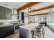 Modern kitchen with stainless steel appliances, spacious island, and stylish cabinets at 450 Yukon St, Lakewood, CO 80226