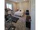 Bedroom with plenty of space for a bed and workout equipment at 56315 E 74Th Ave, Strasburg, CO 80136