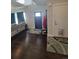The entryway featuring hardwood floors and access to the living room at 56315 E 74Th Ave, Strasburg, CO 80136