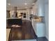 Contemporary kitchen with an expansive layout, stainless steel appliances, and a pantry at 56315 E 74Th Ave, Strasburg, CO 80136
