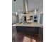 Spacious kitchen featuring an island, stainless steel appliances, and granite countertops at 56315 E 74Th Ave, Strasburg, CO 80136