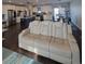 A spacious living room and open concept kitchen and dining area at 56315 E 74Th Ave, Strasburg, CO 80136