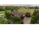 Attractive single story home with a well manicured yard, mature trees and long driveway at 5653 Yank St, Arvada, CO 80002