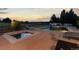 Relaxing outdoor space with a large pool, hot tub, and lounge chairs for ultimate relaxation at 5653 Yank St, Arvada, CO 80002
