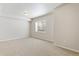 Bright basement featuring neutral walls and carpet, complemented by a window for natural light at 531 Saber Creek Dr, Monument, CO 80132