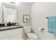 Updated powder room with sleek vanity and modern fixtures at 531 Saber Creek Dr, Monument, CO 80132