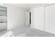 Bright bedroom with neutral walls, carpet and built-in shelving offers a clean and versatile living space at 531 Saber Creek Dr, Monument, CO 80132