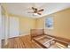Bedroom with hardwood floors and a window with natural light at 6819 Reno Dr, Arvada, CO 80002