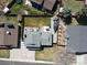 Aerial view showcasing a well-manicured backyard with patio, boat parking, and ample green space at 6844 W 69Th Pl, Arvada, CO 80003