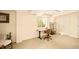 This bedroom can be used as an office and features a desk and great lighting at 6844 W 69Th Pl, Arvada, CO 80003