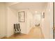 Bright hallway with stylish decor, leading to other areas of the house at 6844 W 69Th Pl, Arvada, CO 80003