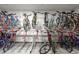 Indoor bicycle storage room equipped with racks for organized and secure bike parking at 1898 S Bannock St # 510, Denver, CO 80223